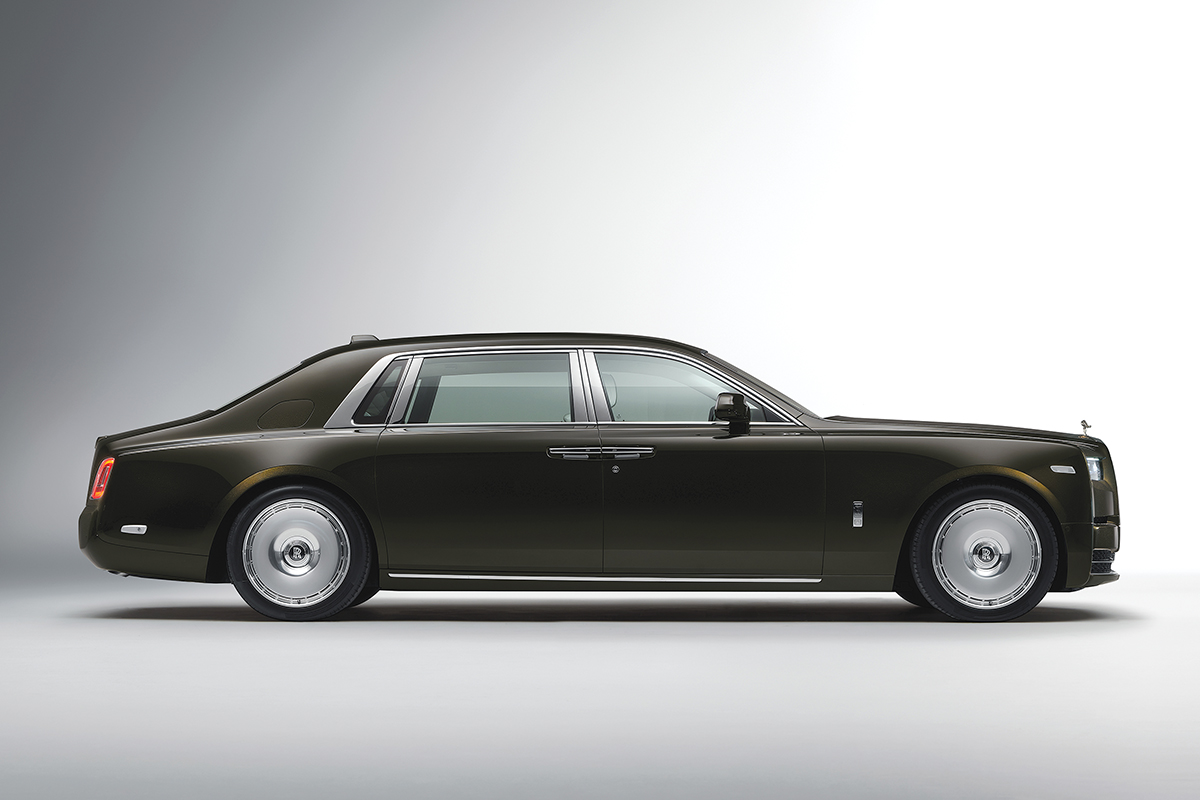 Full side view of Rolls Royce Phantom Series II on white background